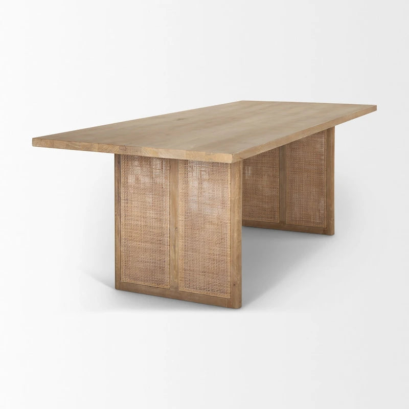 Table de salle à manger rectangulaire Grier en bois massif brun clair avec piètement orné de rotin