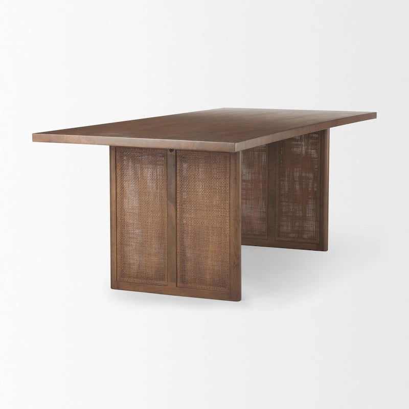 Table de salle à manger rectangulaire Grier en bois massif brun clair avec piètement orné de rotin