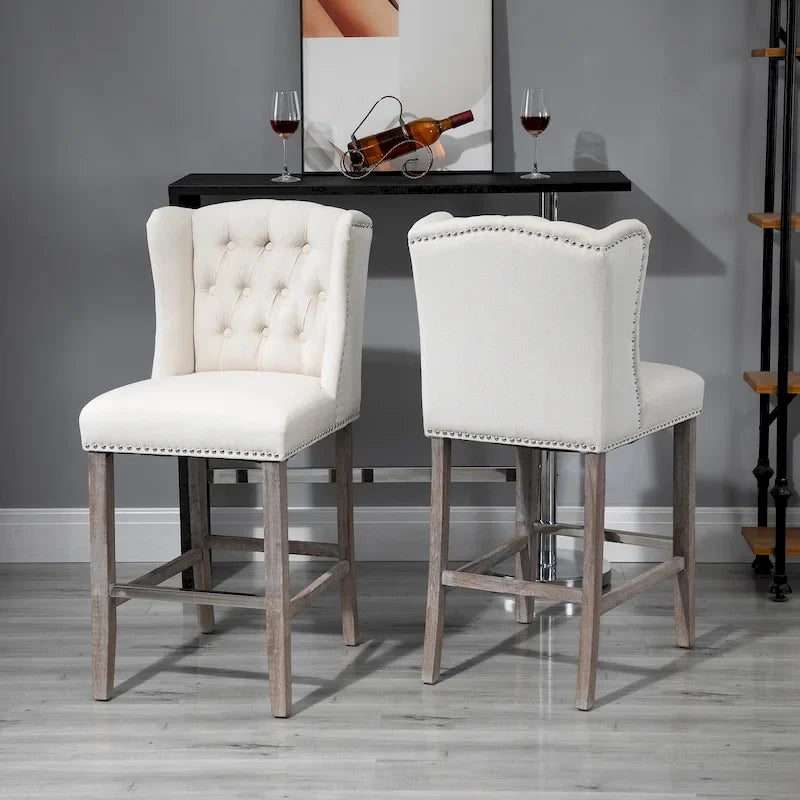 Tabourets de bar HOMCOM (lot de 2) pour cuisine et petit-déjeuner, avec garniture cloutée, dossier capitonné et pieds en bois massif.