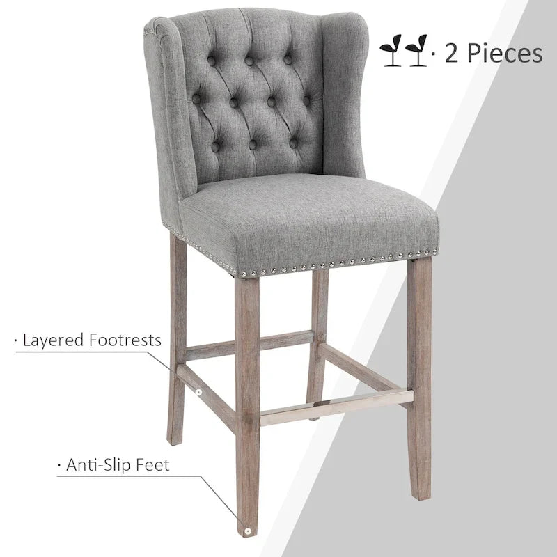 Tabourets de bar HOMCOM (lot de 2) pour cuisine et petit-déjeuner, avec garniture cloutée, dossier capitonné et pieds en bois massif.