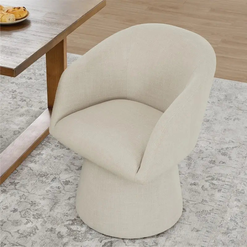 Chaise de salle à manger pivotante moderne Evie, revêtue de tissu.