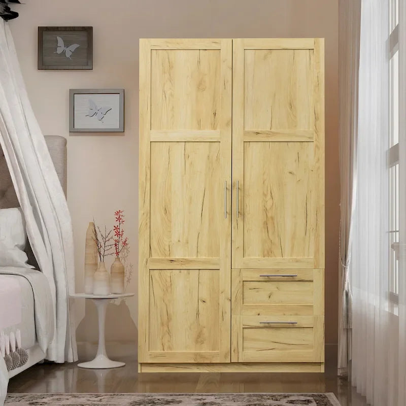 Armoire-penderie en bois blanc avec portes, tiroirs et tringle.